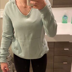 green sweatshirt
